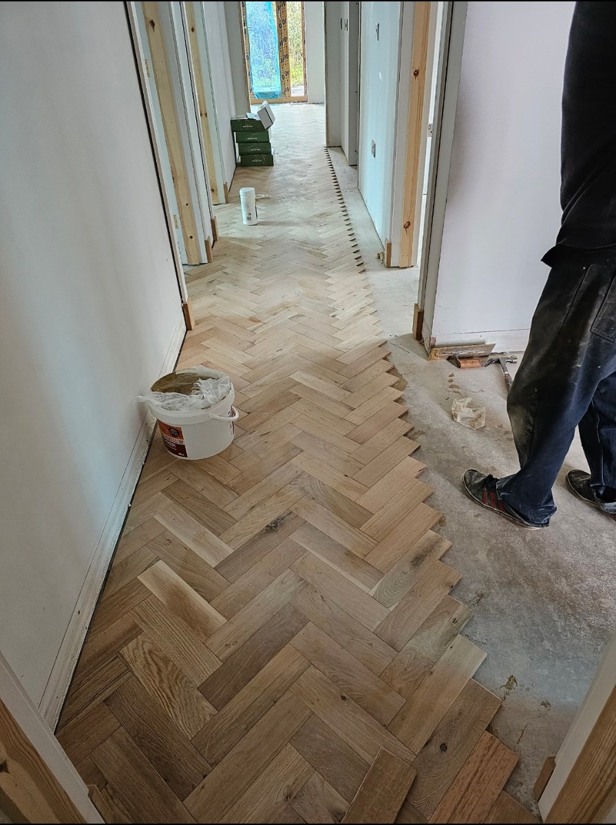 Herringbone flooring installation photo 6