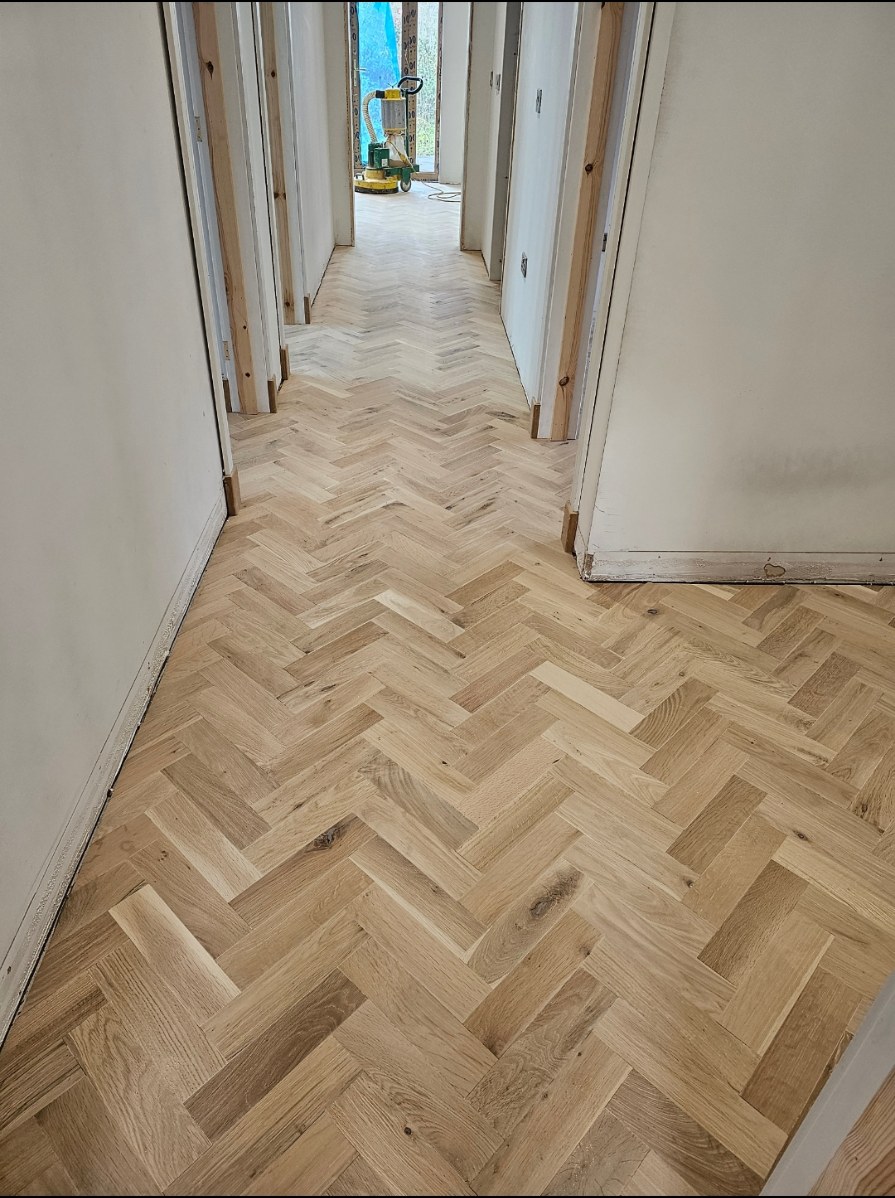 Herringbone flooring installation photo 7
